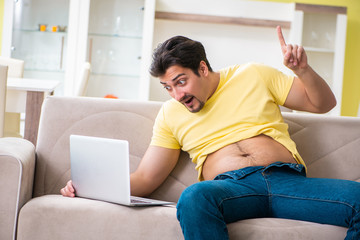 Man searching information in Internet in dieting concept 