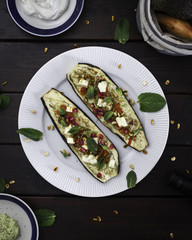 Baked Aubergines with Pomegranate, Mint and Pine Nuts