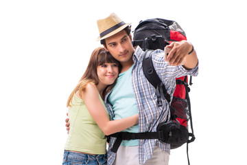 Young family preparing for vacation travel on white