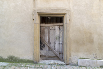 antique entrance door, wood and metal and window