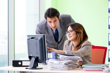Two colleagues working in the office