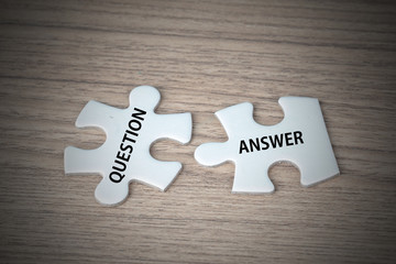 white puzzles with wording of Question and Answer