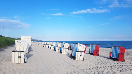Sandy beach and beach chairs on Baltic Sea