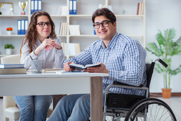 Disabled student studying and preparing for college exams