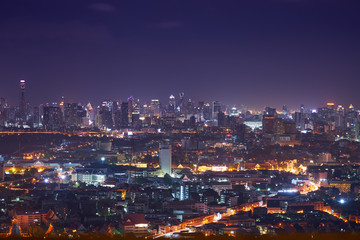 Fototapeta na wymiar night cityscape with light tail speed line in metropolis