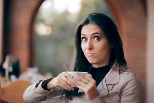 Funny Squeamish Girl with Hot Chocolate Drink