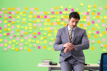 Businessman with many conflicting priorities   