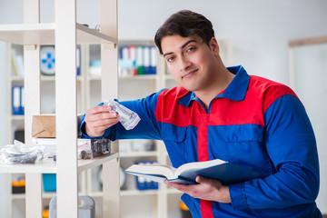 Man working in the postal warehouse