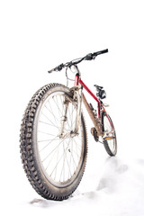 Fototapeta na wymiar very dirty mountain bike, downhill position