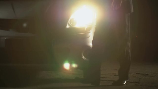 Rich man in business suit buying drugs from dealer near car at night, addiction