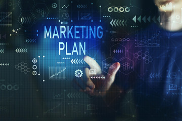 Marketing plan with young man touching screen at night