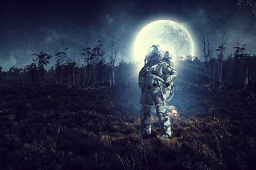 Fototapeta premium Astronaut on his mission. Mixed media