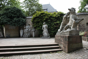 Fototapeta na wymiar Stone statues of Domgarten Skulpturengarten at Speyer town in Rhineland-Palatinate, Germany