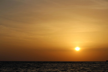 Naklejka na ściany i meble The sunrise around Dutch Bay while on the boat in Trincomalee