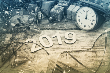 Happy New Year 2019. Symbol from number 2019 on wooden background