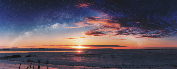 Panoramic winter landscape in sunrise with double exposure night sky landscape