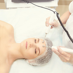 Cosmetology light equipment. Anti age and wrinkle. Microcurrent medicine treatment. Beauty woman....