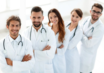 Fototapeta premium medical team standing with arms crossed on a white background