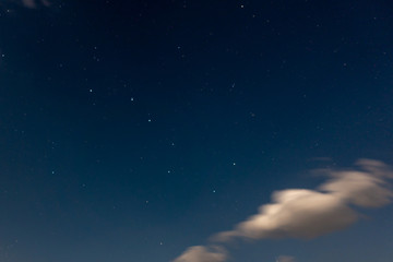 Fototapeta na wymiar Ursa Major constellation in night sky with clouds