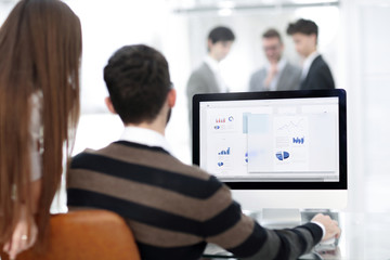 employees analyze marketing scheme
