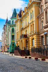 Fototapeta na wymiar Colorful houses of Vozdvizhenka elite district in Kiev, Ukraine