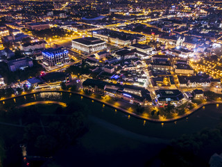 Picturesque panoramic aerial view cityscape with bright street illumination. Minsk, Belarus