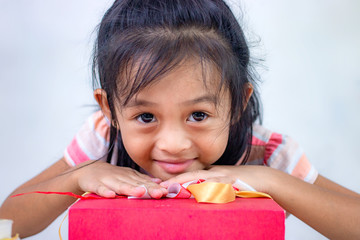 Closeup portrait of little cute asian girl smile.