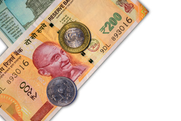 New Indian 50 and 10 rupees with 10 rupees coin on white isolated background.