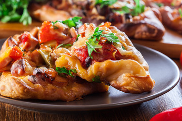 Sliced traditional Turkish pide with meat and vegetables