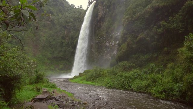 Condor Machay Waterfall slow motion. In the Rio Pita Valley near Cotopaxi Volcano, Ecuador