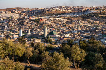 Obraz premium Aerial view of old Fez medina and Al Karaouine mosque(al-Qarawiyyin or Al Quaraouiyine) in Morocco