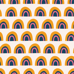 Abstract rainbows seamless vector pattern. Cute hand drawn rainbows orange, pink, and blue on white background. Scandinavian style. Great for kids market - fabric, paper, wallpaper, gift wrap, girl