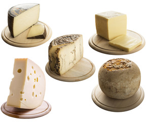 Set of loafs of emmentaler, cheese with truffles, manchego,Edamer, Mimollete isolated.