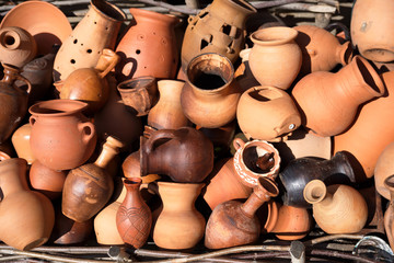 Fototapeta na wymiar background of a lot of clay jugs, ceramics