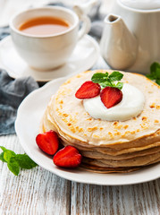 Delicious pancakes with strawberry