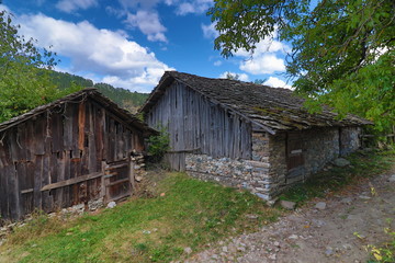 Old houses in the historical cultural reserve village of Dolen, Bulgaria. Dolen is famous with its 350 old houses – an example of 19th century Rhodopean architecture. 