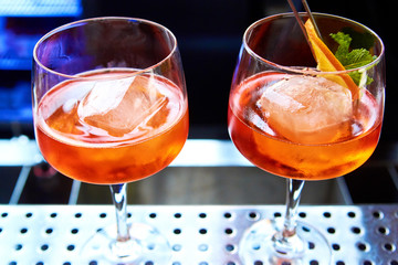 Aperol Spritz preparation of a bright alcoholic cocktail