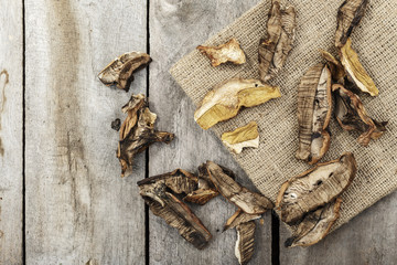dried mushrooms on a wooden table