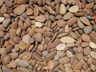 background of smooth stones in garden