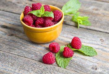 Delicious fresh raspberries on wood