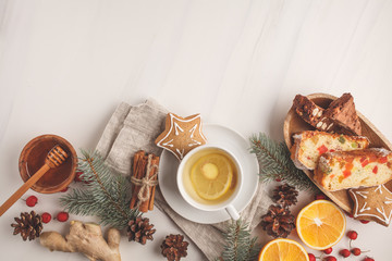 Christmas desserts of different countries (panforte, cookies and Christmas bread) on a white background.