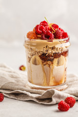 Overnight oatmeal with berries, peanut butter, banana and berries.