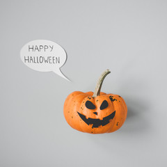 Happy halloween. Halloween pumpkin Jack o Lantern on gray background