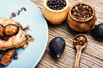Meat steak with figs on plate