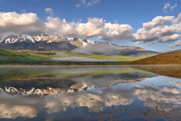 clouds lake fog mountains reflections