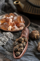 rolled tea leaves into a large pearl. Chinese tea from Yunnan province. Biluochun. Tea ceremony