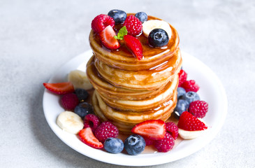 Delicious pancakes with fruit