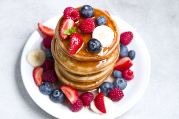 Delicious pancakes with fruit