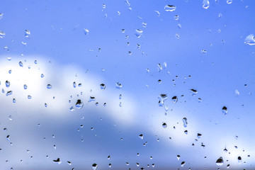 Wet glass with drops of rain