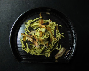 Homemade Zaru Ramen Noodle with dried seaweed and Dried Bonito Katsuo Bushi on black background / Japanese Food